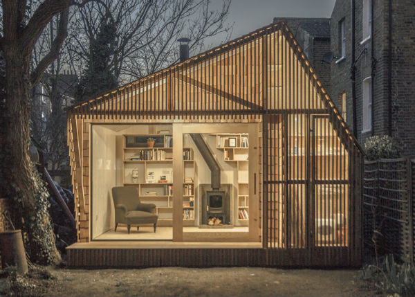 Уютна асиметрична дървена къща-студио