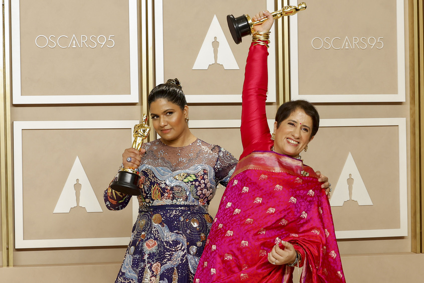 Kartiki Gonsalves and Guneet Monga, winners of the Best Documentary Short Film award for "The Elephant Whisperers," pose in the press room during the 95th Annual Academy Awards on March 12, 2023 in Hollywood, California. (Photo by Mike Coppola/Getty Images)